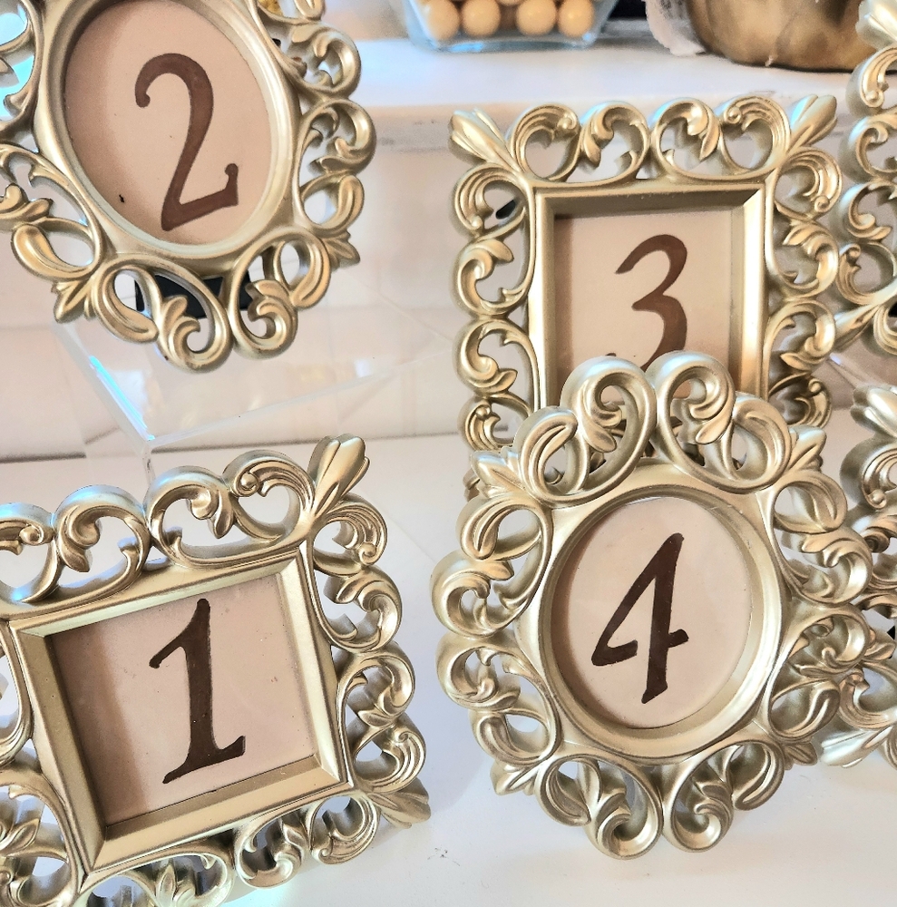Custom framed gold tone table numbers